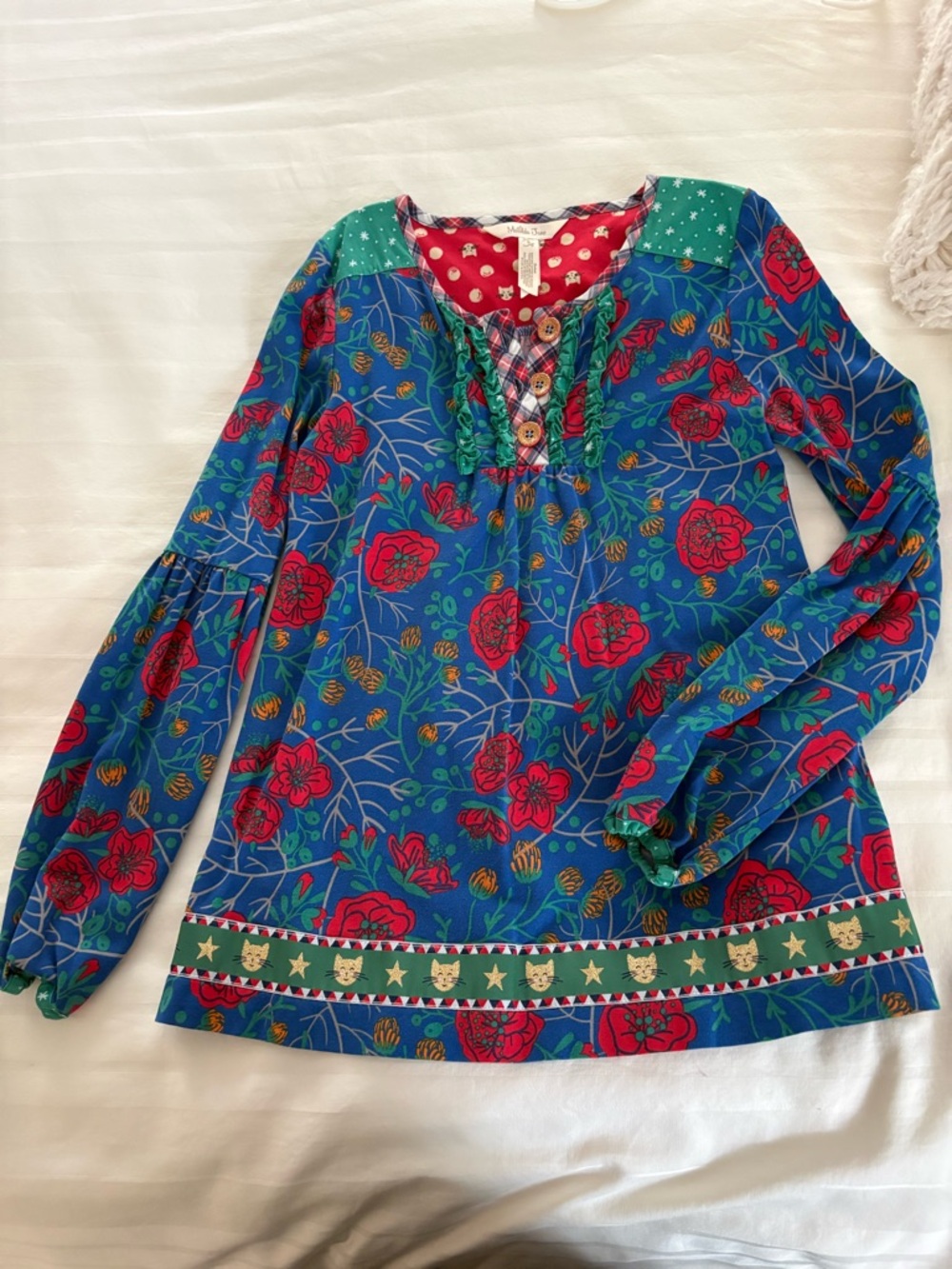 Blue Floral Long-Sleeve Girl’s Top with Red Accents